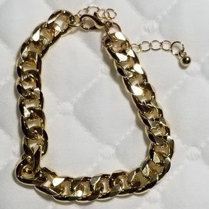 Large Cuban chain bracelet.